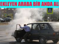 Bafra'da Tofaş kavşağında kırmızı ışıkta bekleyen araba yandı