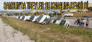 OTOMOBİL YÜKLÜ TREYLER DEVRİLDİ