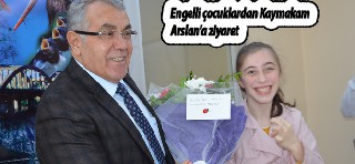 ENGELLİ ÇOCUKLARDAN BAFRA KAYMAKAMI HALİS ARSLAN’A ANLAMLI ZİYARET