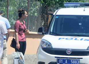 Eşinden kaçıp polisi aradı