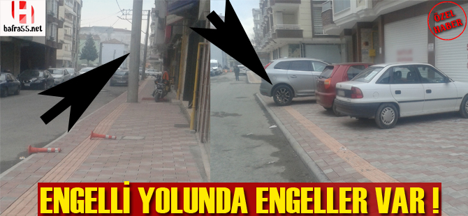 Engelli yolunda engeller var