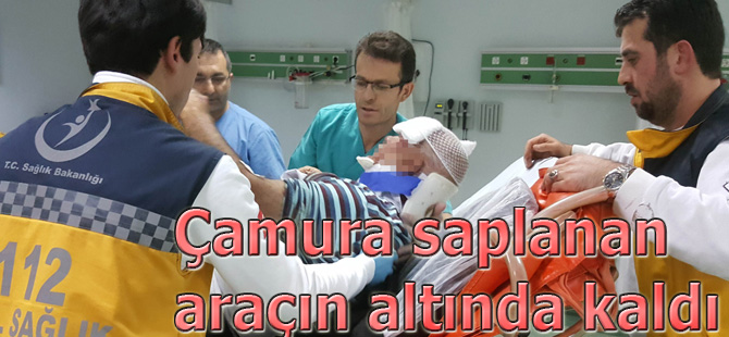 Çamura saplanan aracın altında kaldı