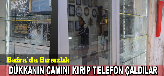 Dükkanın camını kırıp telefon çaldılar