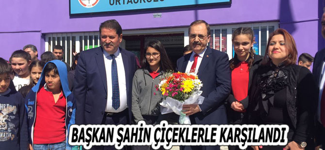 BAŞKAN ŞAHİN ÇİÇEKLERLE KARŞILANDI