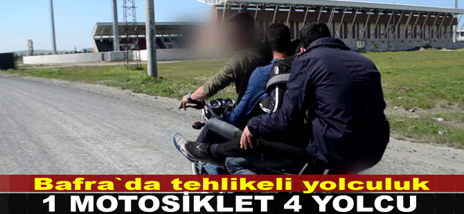 Bir motosiklet dört yolcu