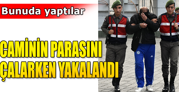 CAMİNİN PARASINI ÇALARKEN YAKALANDI