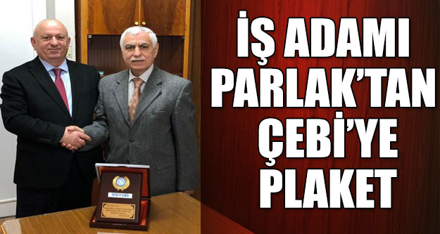 Bafralı İş adamı Osman Parlak’tan Çebi’ye Plaket