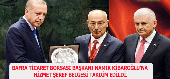 BAFRA TİCARET BORSASI BAŞKANI NAMIK KİBAROĞLU’NA HİZMET ŞEREF BELGESİ TAKDİM EDİLDİ.