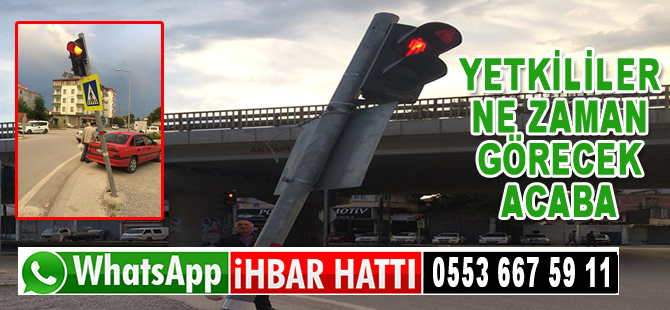 Yan yatan trafik lambası tehlike saçıyor