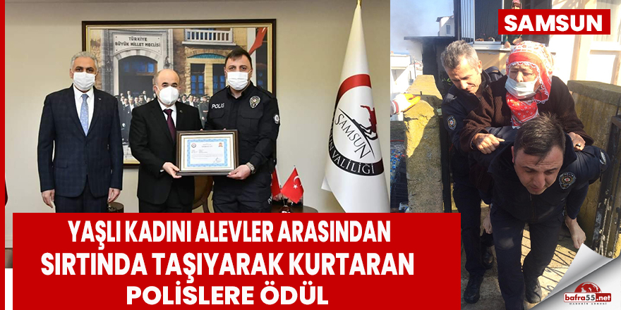 Yaşlı kadını alevler arasından sırtında taşıyarak kurtaran polislere ödül