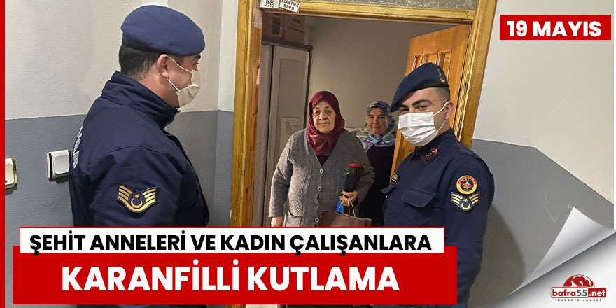 Şehit anneleri ve kadın çalışanlara karanfilli kutlama