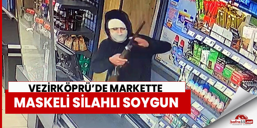 Markette maskeli silahlı soygun girişimi