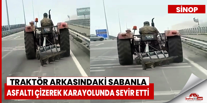 Traktör arkasındaki sabanla asfaltı çizerek karayolunda seyir etti