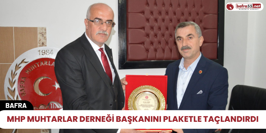 MHP Muhtarlar Derneği Başkanını Plaketle Taçlandırdı