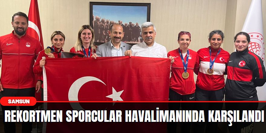 Rekortmen sporcular havalimanında karşılandı