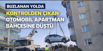 Buzlanan Yolda Kontrolden Çıkan Otomobil Apartman Bahçesine Düştü