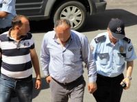 KOCALARA EŞLERİNİ DARP GÖZALTISI