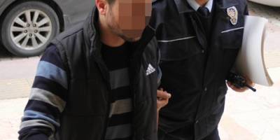 EŞİNİ DARPTAN GÖZALTINA ALINDI