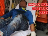 SOKAK ORTASINDA JİLETLE KENDİNİ PARÇALADI