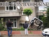 OTOMOBİL EVİN BAHÇESİNE UÇTU