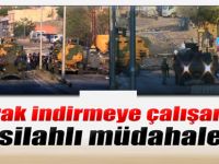 Bayrak indirmeye çalışanlara silahlı müdahale