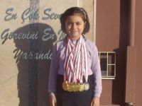 MİNİK SPORCUDAN İLÇEYE MADALYA