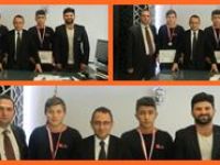 Başarılı güreşçilerden Kaymakama Çağlar'a ziyaret