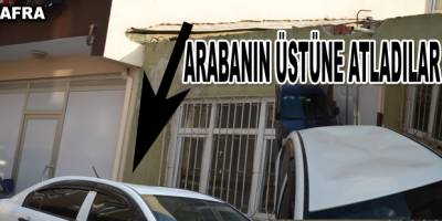 Çocuklar arabanın üstüne atladılar