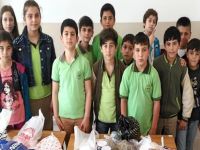 ''Komşun açken,tok yatma''