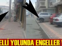 Engelli yolunda engeller var