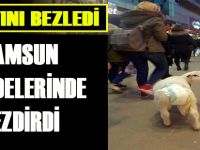 Altını bezlediği kuzuyla caddede dolaştı
