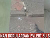 Tıkanan borulardan evleri su bastı