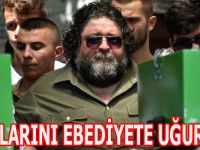 Gözetim altında evlatlarını ebediyete yolcu etti