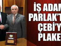 Bafralı İş adamı Osman Parlak’tan Çebi’ye Plaket