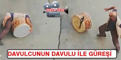 BAFRALI DAVULCU DAVULU İLE GÜREŞİYOR