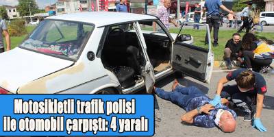 Motosikletli trafik polisi ile otomobil çarpıştı: 4 yaralı
