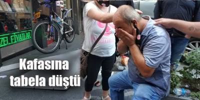 Kafasına tabela düştü