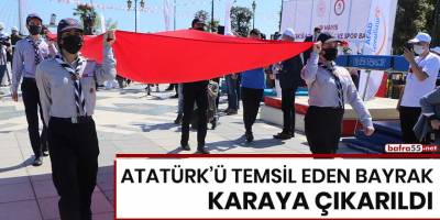 Atatürk'ü temsil eden bayrak karaya çıkarıldı