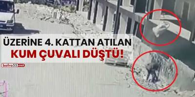 Üzerine 4'üncü kattan atılan kum çuvalı düştü!