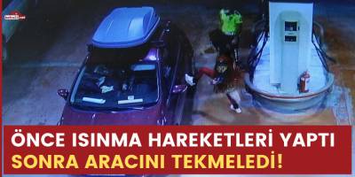 Önce ısınma hareketleri yaptı sonra aracını tekmeledi