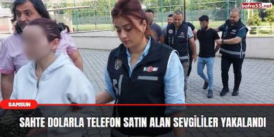 Sahte dolarla telefon satın alan sevgililer yakalandı