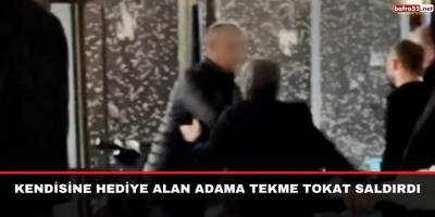 Kendisine hediye alan adama tekme tokat saldırdı