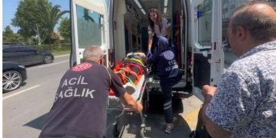 Elektrikli bisikletle düşen genç kadın hastaneye kaldırıldı