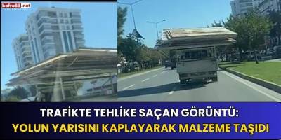 Trafikte tehlike saçan görüntü: Yolun yarısını kaplayarak malzeme taşıdı