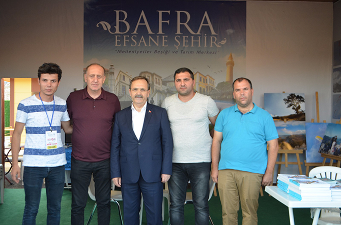 baskan-sahin-bafra-icin-elleri-ile-nokul-dagitti-003.jpeg